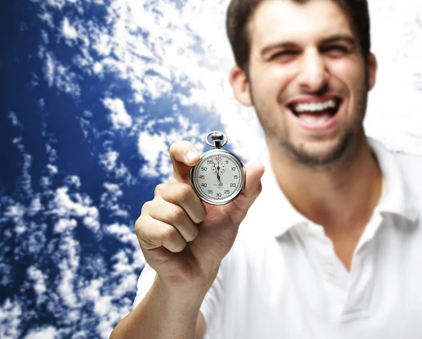 Uomo con cronometro in mano — Foto Stock