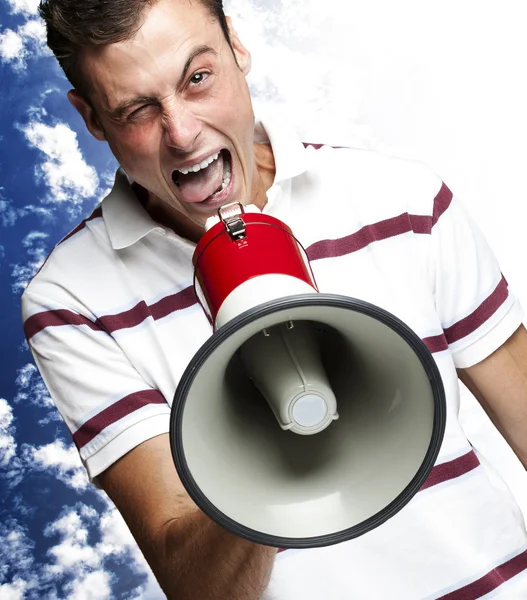 Człowiek krzyczący z megafon — Zdjęcie stockowe
