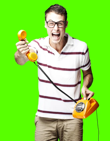 Man holding telephone — Stock Photo, Image