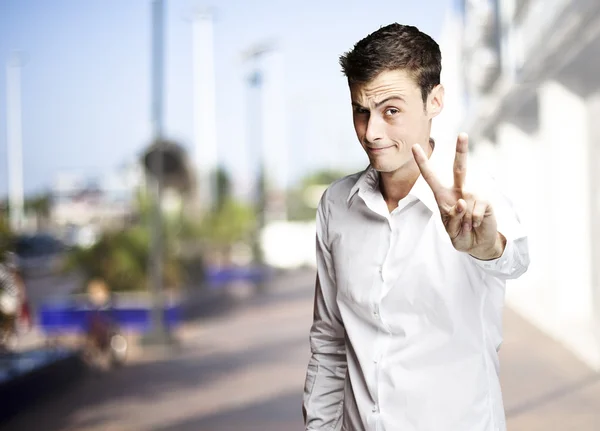 Man gesturing at outdoor — Stock Photo, Image