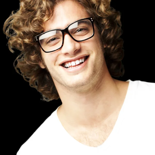 Young man smiling — Stock Photo, Image