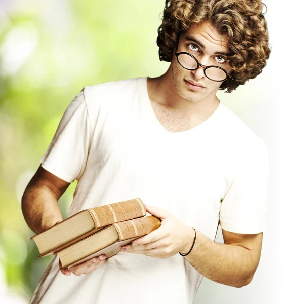 Man holding books — Stock Photo, Image
