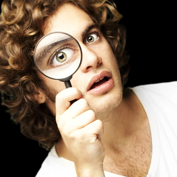 Man with magnifying glass — Stock Photo, Image