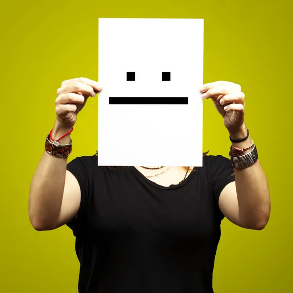 Woman with poker face emoticon — Stock Photo, Image