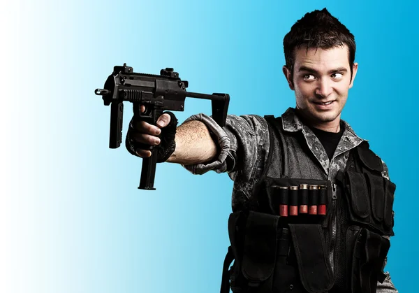 Young armed soldier Stock Photo
