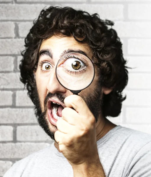 Man with magnifying glass Royalty Free Stock Images
