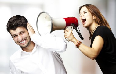 Woman shouting with megaphone clipart