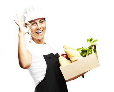 Woman carrying groceries clipart