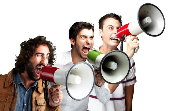 Giovane urlando con megafono su sfondo bianco — Foto Stock
