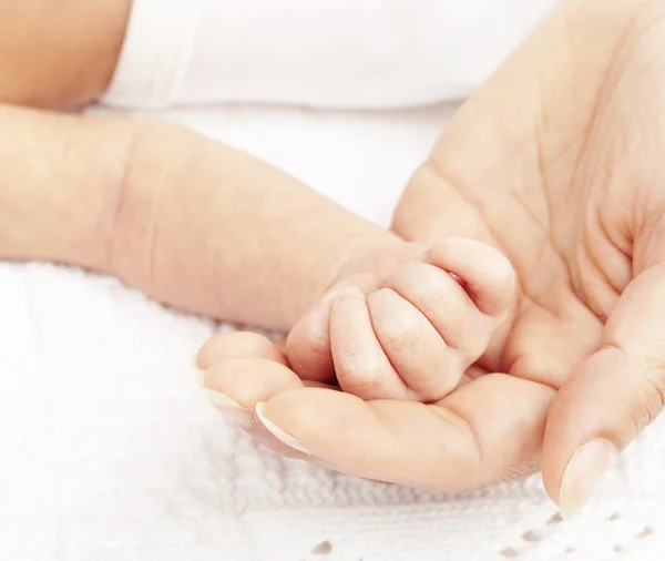 Newborn baby hand — Stock Photo, Image