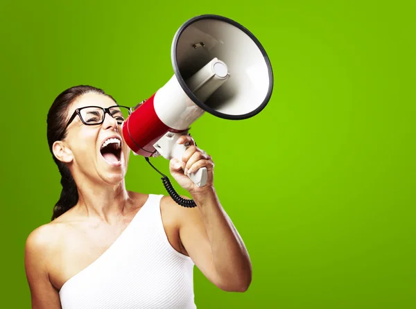Woman shouting using megaphone — Stock Photo, Image