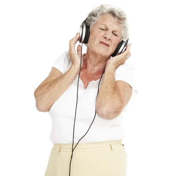 Senior woman listen music — Stock Photo, Image
