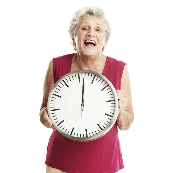 Femme âgée avec horloge — Photo