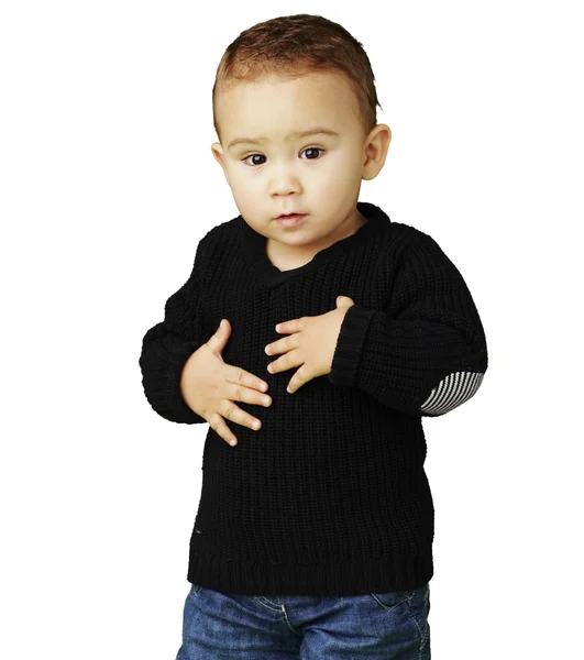 Portrait of adorable kid touching his stomach against a white ba — Stock Photo, Image