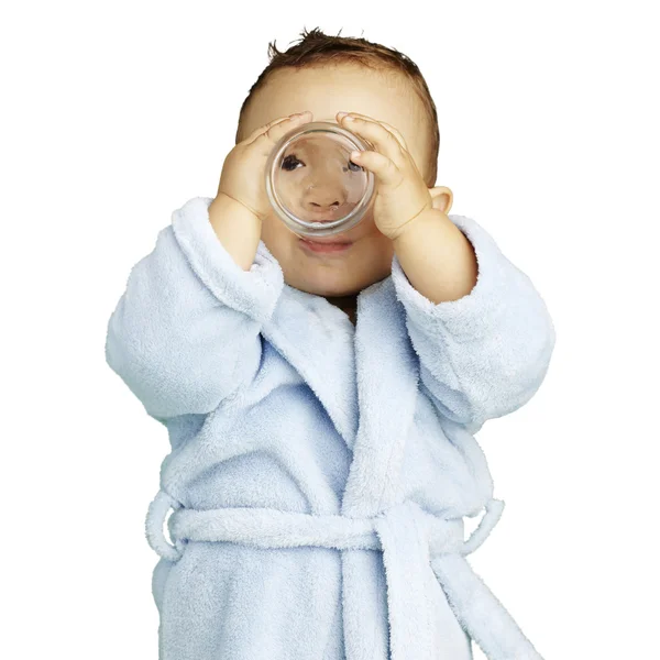 Portrait of adorable infant with blue bathrobe drinking water ov — Stock Photo, Image