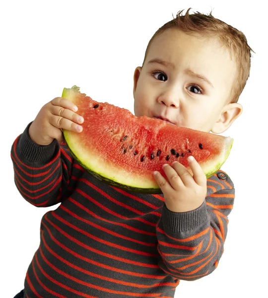 Porträtt av stilig liten innehar en vattenmelon över vita backg — Stockfoto