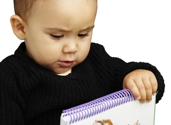 Portret dziecko gospodarstwa Notebook na białym tle — Zdjęcie stockowe