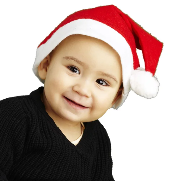 Portrét šťastné dítě nosí vánoční kapoty nad bílým zpět — Stock fotografie