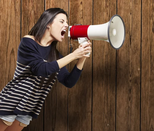 Woman with a megaphone — Stock Photo, Image