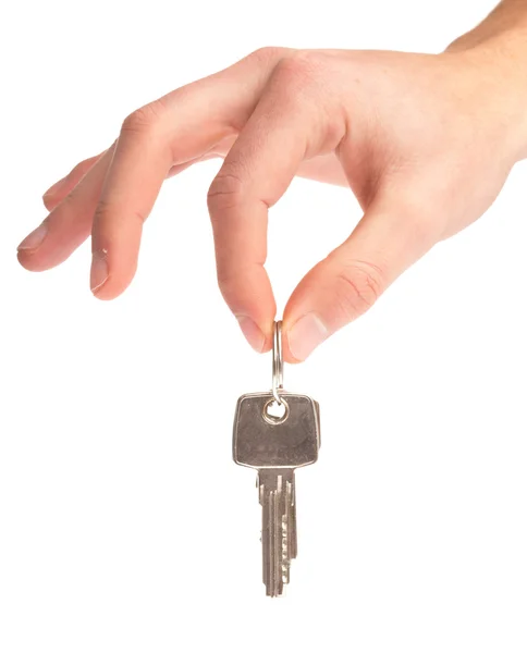 Ruka držící klíče — Stock fotografie