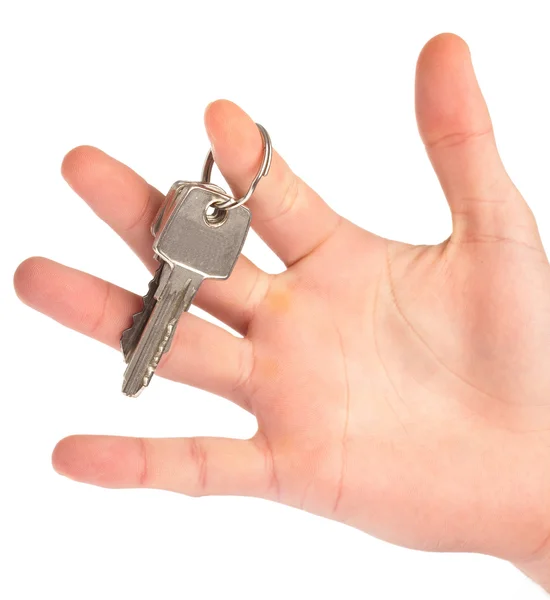 Hand hält einen Schlüssel — Stockfoto