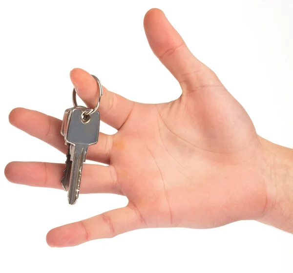 Kéz kezében egy kulcs — Stock Fotó