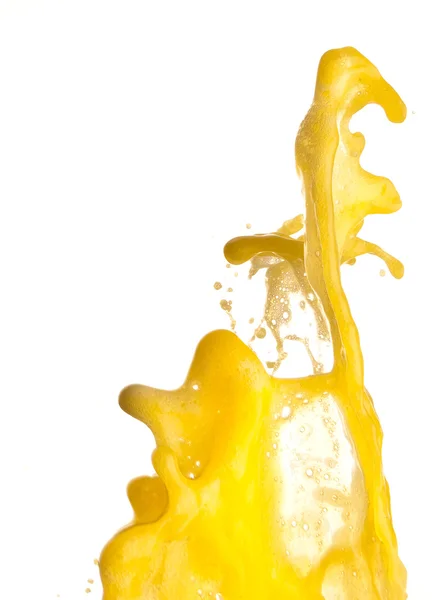 Брызги апельсинового сока на белом фоне — стоковое фото