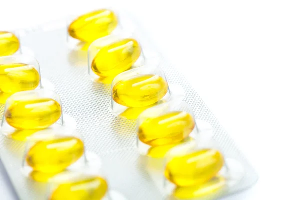 Жовті таблетки — стокове фото