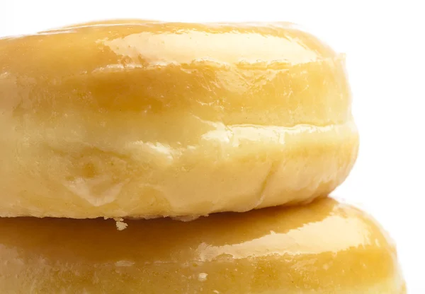 Цукрові пончики екстремально крупним планом на білому тлі — стокове фото