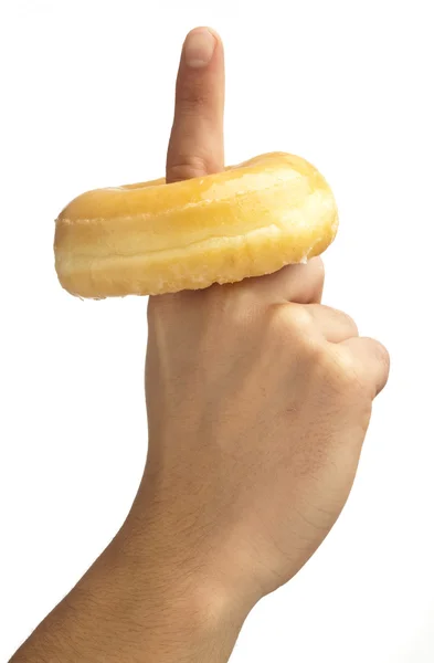 Палец с сахарным пончиком на белом фоне — стоковое фото