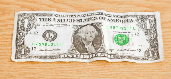 Dollaro sul tavolo — Foto Stock