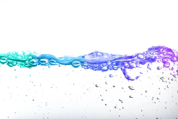 Rainbow water on a white background — Stock Photo, Image