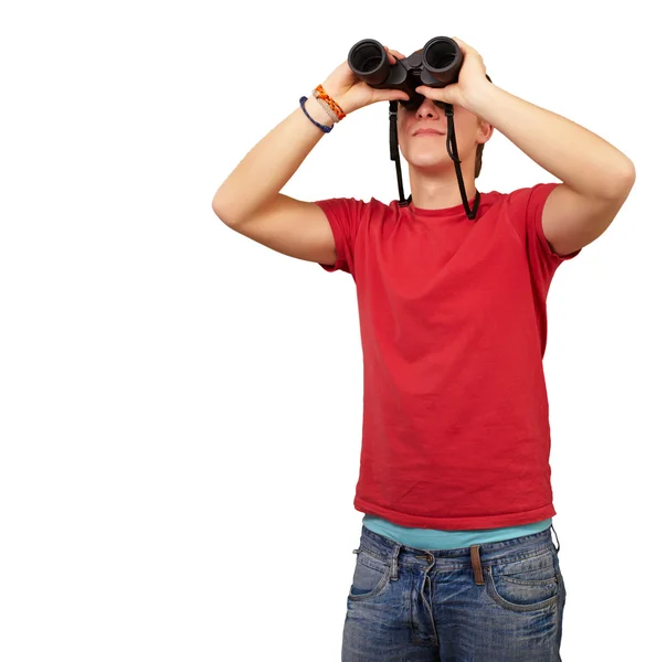 Porträtt av ung man med kikare på vit bakgrund — Stockfoto