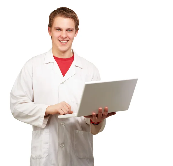 Πορτρέτο του νεαρός φοιτητής κρατώντας το laptop πάνω από το λευκό φόντο — Φωτογραφία Αρχείου
