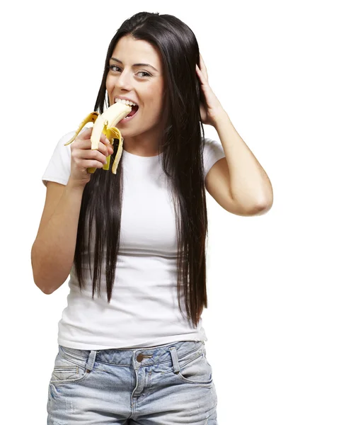 Žena jí banán — Stock fotografie