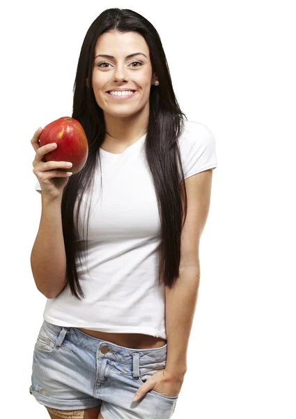 Woman holding a mango — Stok fotoğraf