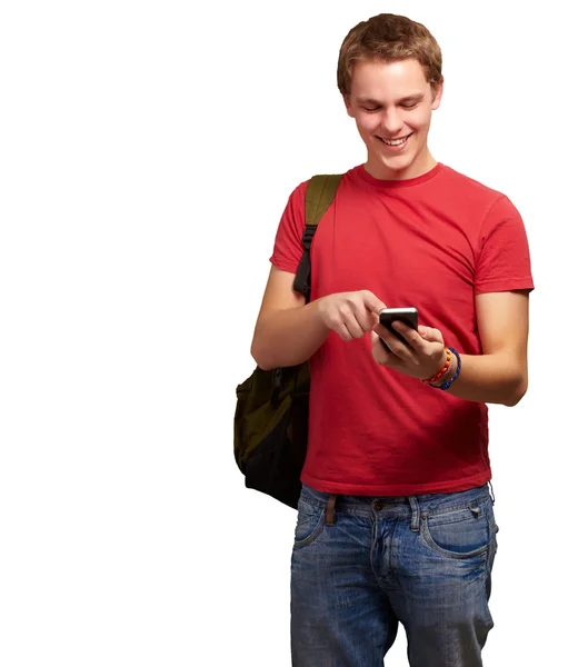 Ritratto di giovane uomo che tocca lo schermo mobile su un backgrou bianco — Foto Stock