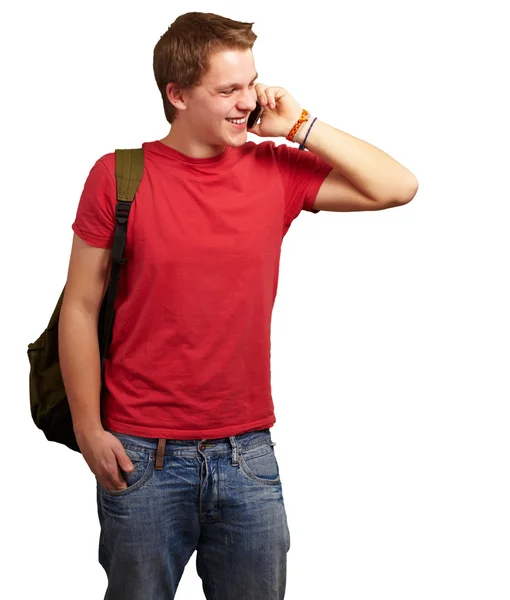 Retrato de jovem falando no celular sobre fundo branco — Fotografia de Stock