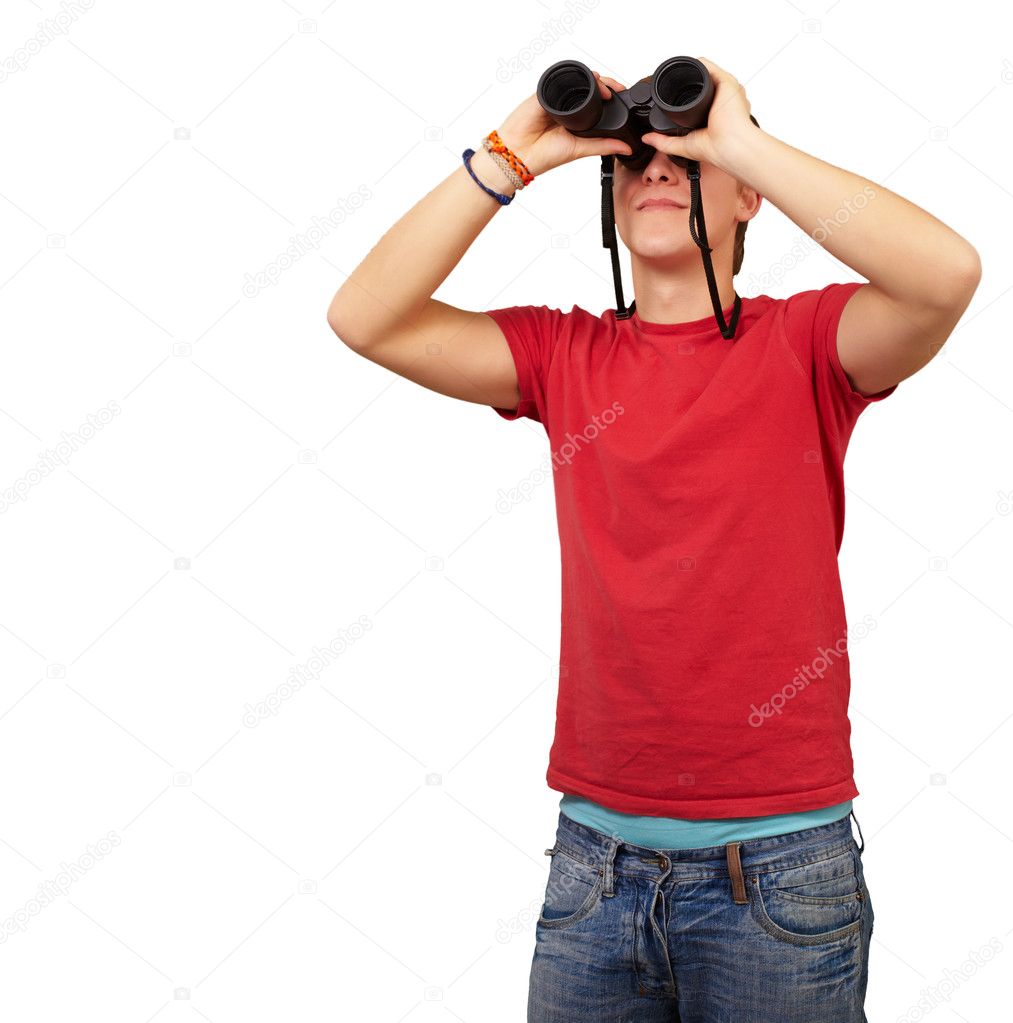 Portrait of young man with binoculars over white background