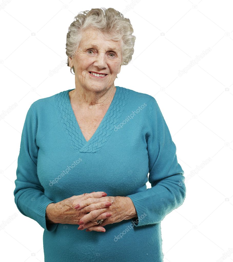 Portrait of senior woman standing over white background