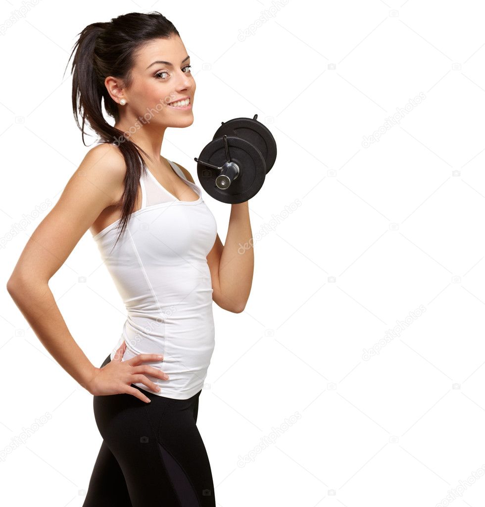 Portrait of a young pretty woman holding weights and doing fitne