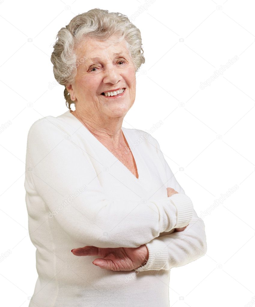 Portrait of senior woman smiling over white background
