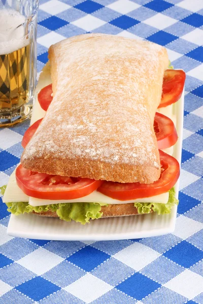 Italian panino sandwich and beer — Stock Photo, Image