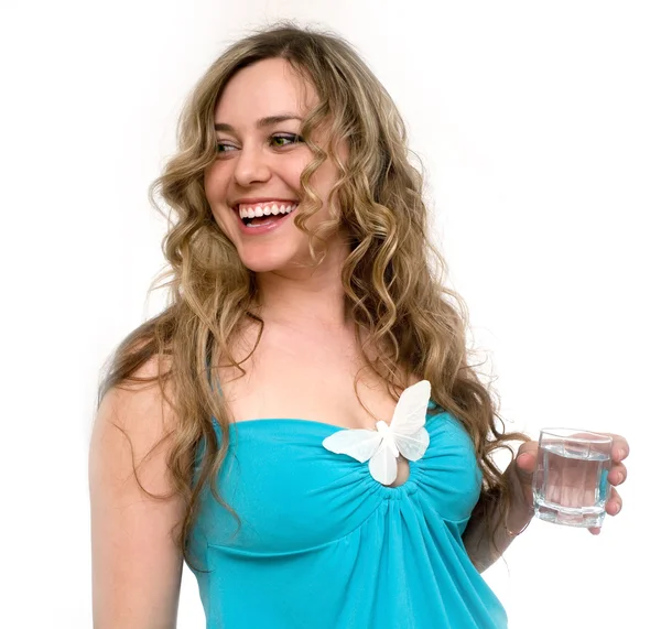 Girl holding a big glass of water — Stock Photo, Image