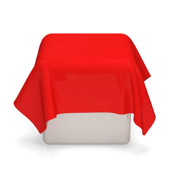 Pano vermelho coberto cubo branco no fundo branco — Fotografia de Stock