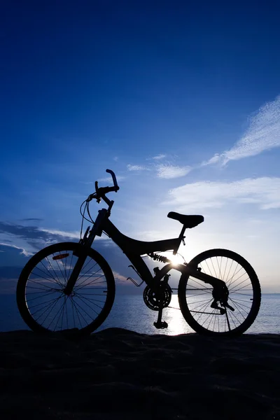 stock image Silhouette of a Bike on the Beach