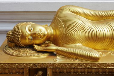 Reclining Buddha clipart