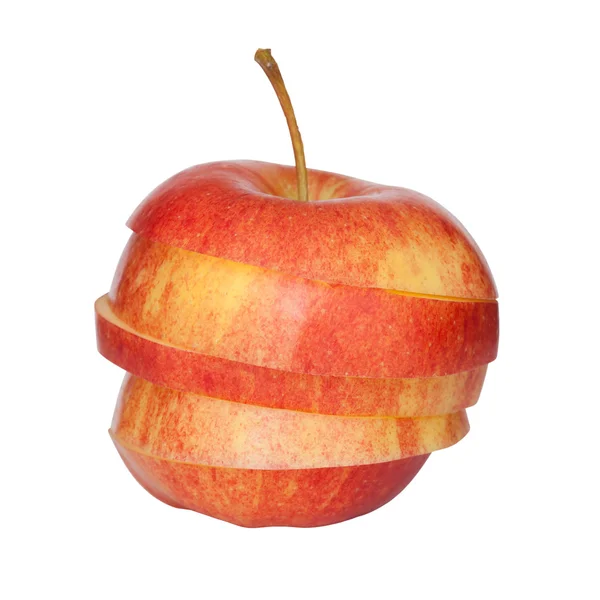 Разрежьте красное яблоко на кусочки — стоковое фото