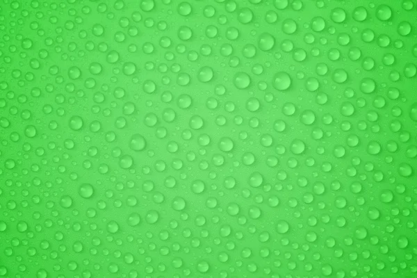 Kapky vody na zelené — Stock fotografie