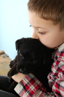 Boy and puppy clipart